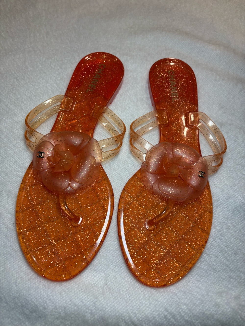 CHANEL CC Jelly Camellia
Glitter Thong Sandals